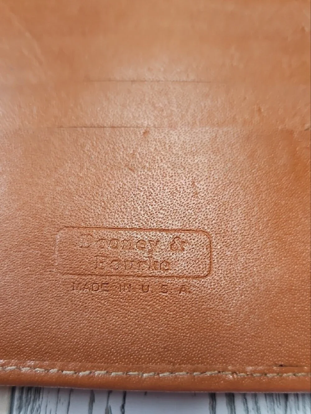 Vintage Dooney & Bourke All-Weather Leather compact wallet in hunter green/tan